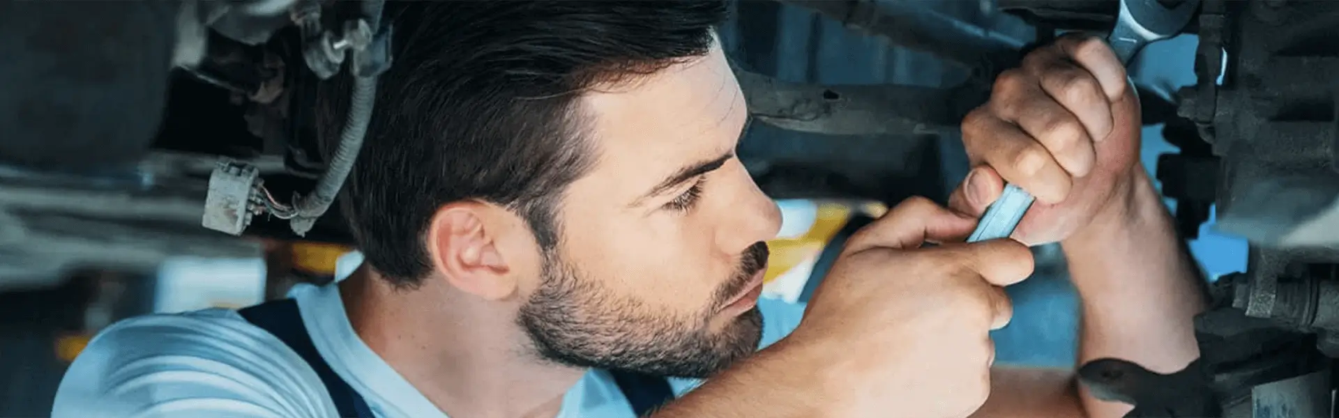 Service Mechanic Working On A Vehicle Banner